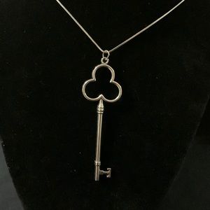 Silver key pendant charm